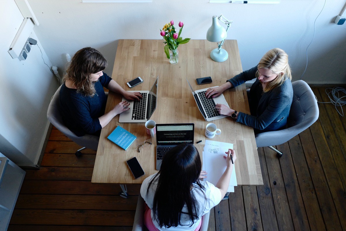 office noise cancelling machine - office with women